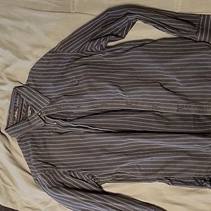 Blue and dark gray with white striped long sleeve button down shirt.